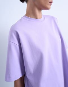 Model wearing Premium interlock oversized tee in lilac