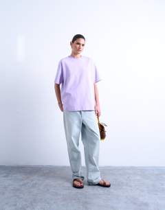 Model wearing Premium interlock oversized tee in lilac