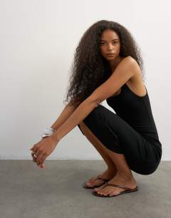 Model wearing Premium jersey double layered skinny strap 90s length midi dress in black