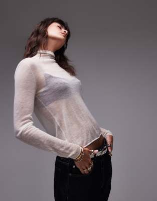 premium knitted sheer cashmere grown on neck top in ivory-White