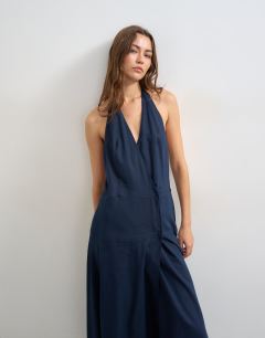Model wearing Premium linen rich halter neck wrap maxi dress in dark navy