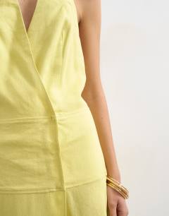 Model wearing Premium linen rich halter neck wrap maxi dress in muted lime