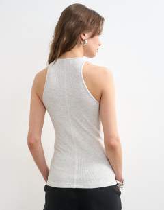 Model wearing Premium lyocell blend soft rib racer vest in grey