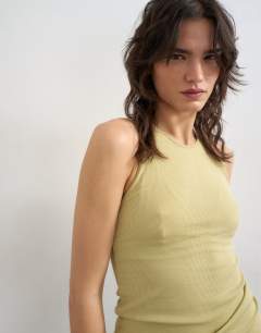 Model wearing Premium lyocell blend soft rib racer vest in soft khaki