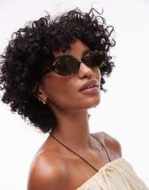 AIRE Amalthea cat eye sunglasses in emerald green 