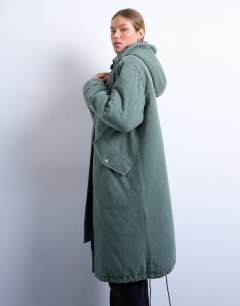 Model wearing Premium oversized parka with fur hood in khaki