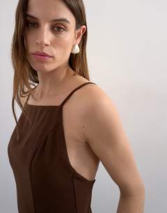 Model wearing Premium pleated high godet maxi dress in brown