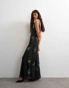 Premium plunge neck sheer maxi dress with chain embellishment in black
