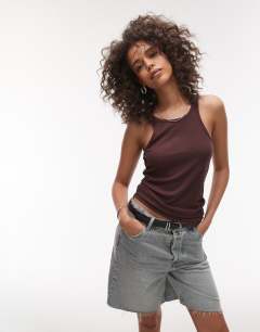 Model wearing Premium racer vest in chocolate