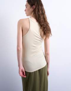Model wearing Premium racer vest in ivory