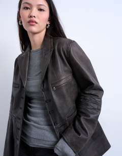 Model wearing Premium real leather blazer with patch pockets in washed black