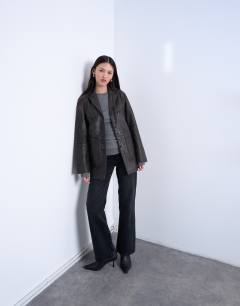 Model wearing Premium real leather blazer with patch pockets in washed black