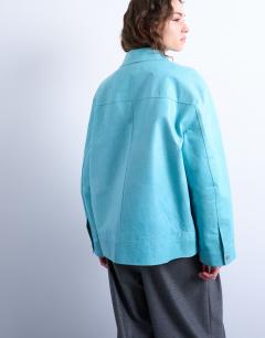 Model wearing Premium real leather jacket in turquoise