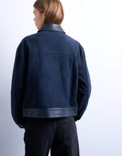 Model wearing Premium real suede jacket in navy
