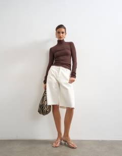 Model wearing Premium rib funnel neck long sleeve top in chocolate