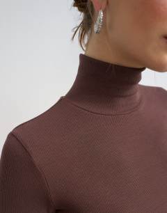 Model wearing Premium rib funnel neck long sleeve top in chocolate