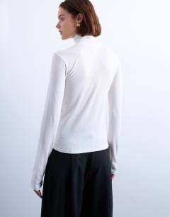 Model wearing Premium rib funnel neck top in ecru