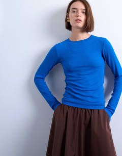 Model wearing Premium rib long sleeve top in blue