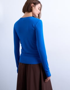 Model wearing Premium rib long sleeve top in blue