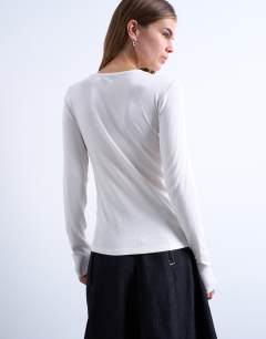 Model wearing Premium rib long sleeve top in ecru