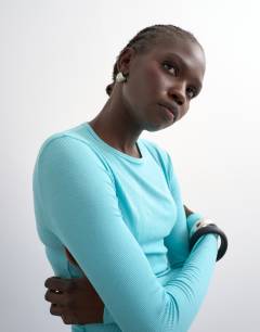 Model wearing Premium rib long sleeve top in light blue