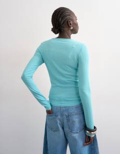 Model wearing Premium rib long sleeve top in light green