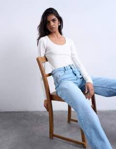 Model wearing Premium rib long sleeve wide scoop neck top in ecru