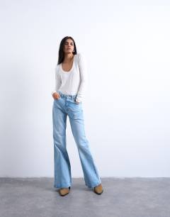 Model wearing Premium rib long sleeve wide scoop neck top in ecru