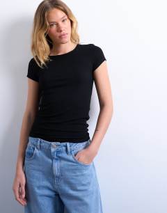 Model wearing Premium rib short sleeve tee in black