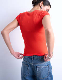 Model wearing Premium rib short sleeve tee in red