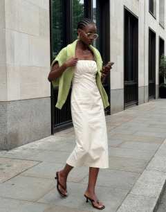 Model wearing Premium ruched bust midi dress in cream