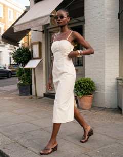 Model wearing Premium ruched bust midi dress in cream