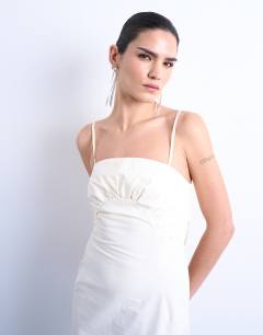 Model wearing Premium ruched bust midi dress in cream