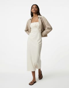 Model wearing Premium ruched bust midi dress in cream