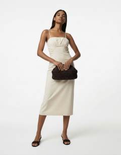 Model wearing Premium ruched bust midi dress in cream
