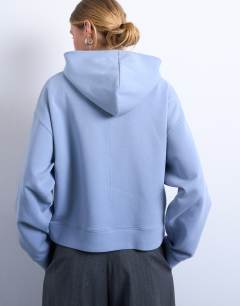 Model wearing Premium scuba oversized jean grazer hoodie in blue