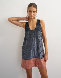Model wearing Premium sequin embellished low scoop mini dress with contrast deep in gunmetal and peach