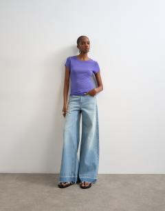 Model wearing Premium sheer rib short sleeve top in purple