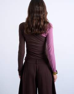 Model wearing Premium sheer rib v-neck double layer long sleeve top in pink and chocolate