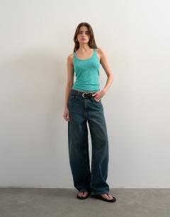 Model wearing Premium spaghetti strap scoop racer vest in blue