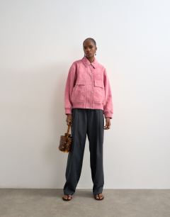 Model wearing Premium suede bomber jacket in pink