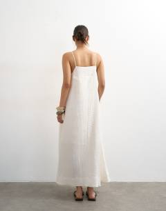 Model wearing Premium textured maxi sundress in white