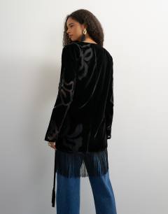 Model wearing Premium velvet sheer embroidered detail bed jacket mini dress with fringed hem in black