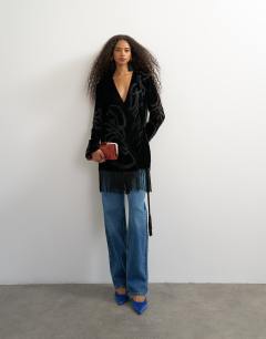 Model wearing Premium velvet sheer embroidered detail bed jacket mini dress with fringed hem in black