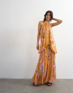 Model wearing Premium viscose blouson halter neck maxi dress with open back and train in handpainted floral print
