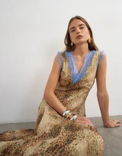 Model wearing Premium viscose lace insert pintucked maxi tea dress in animal print with contrast blue lace