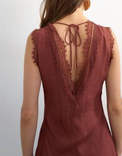 Model wearing Premium viscose lace insert pintucked maxi tea dress in rust