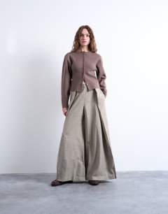 Model wearing Premium wrap around extreme wide leg tailored trousers in stone - STONE
