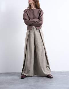 Model wearing Premium wrap around extreme wide leg tailored trousers in stone - STONE