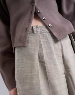 Model wearing Premium wrap around extreme wide leg tailored trousers in stone - STONE